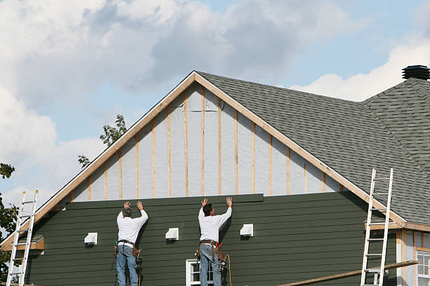 Professional Siding Replacement technician working in Ashville, PA